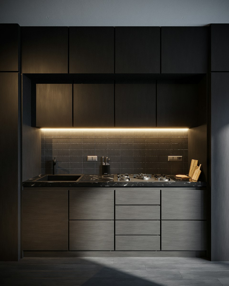 Cocina compacta remodelada en un apartamento pequeño
